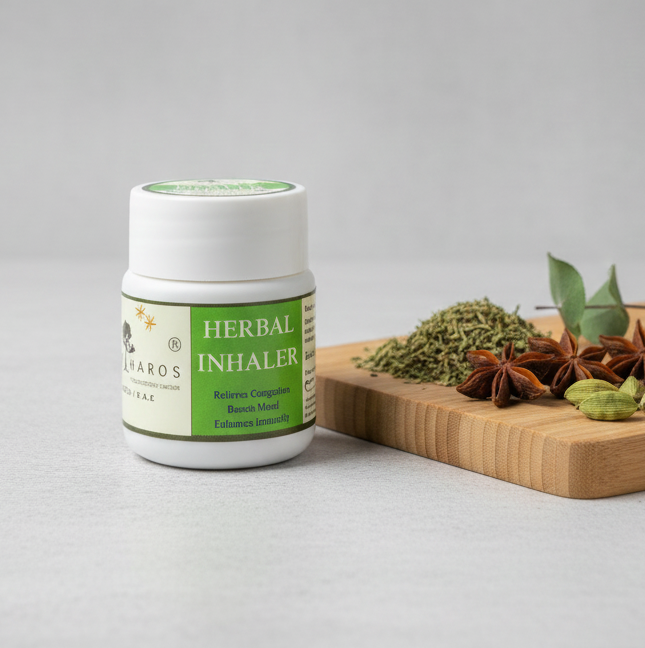 Herbal Inhaler bottle with ingredients on a wooden board against a gray background